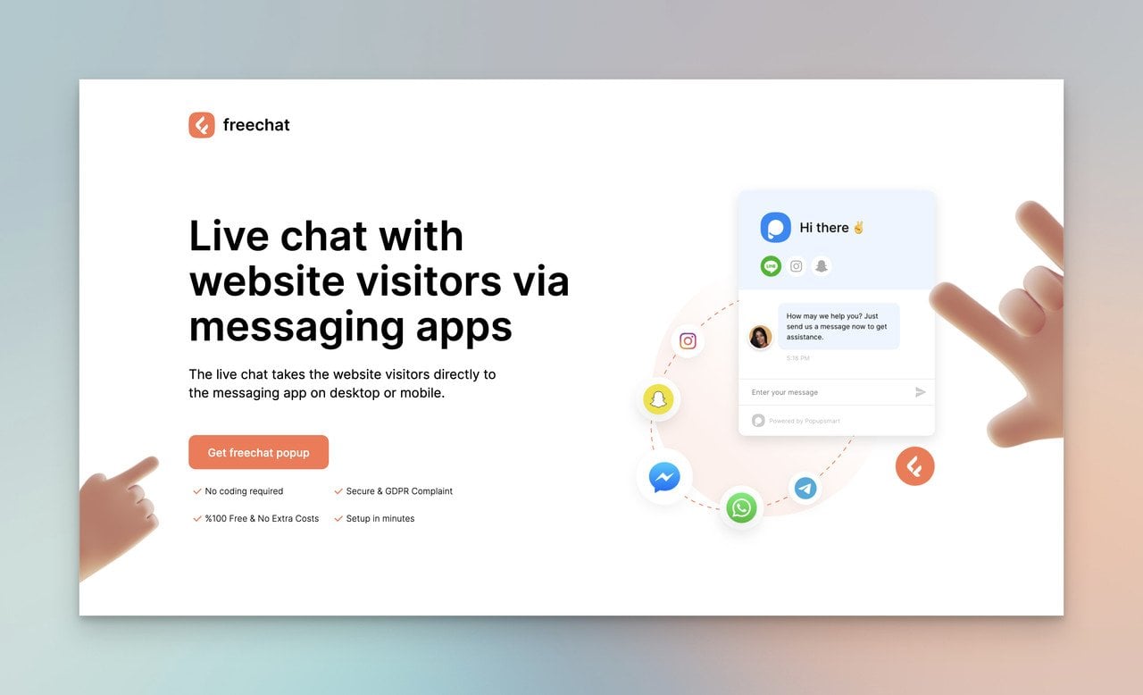 FreeChat popup customization tool homepage with illustration of hands pointing at an online chat