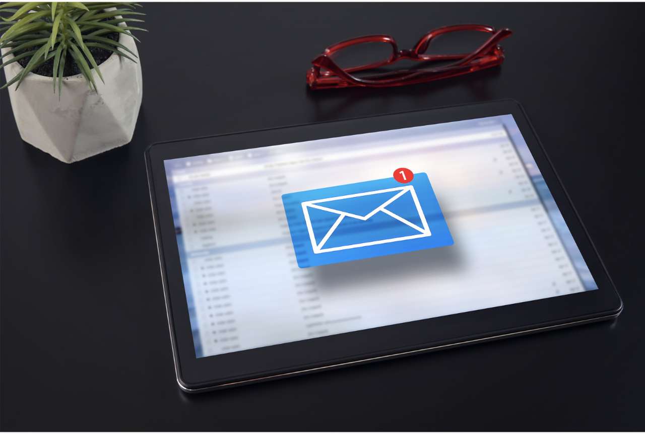 an image of a tablet showing an email application open on it's screen