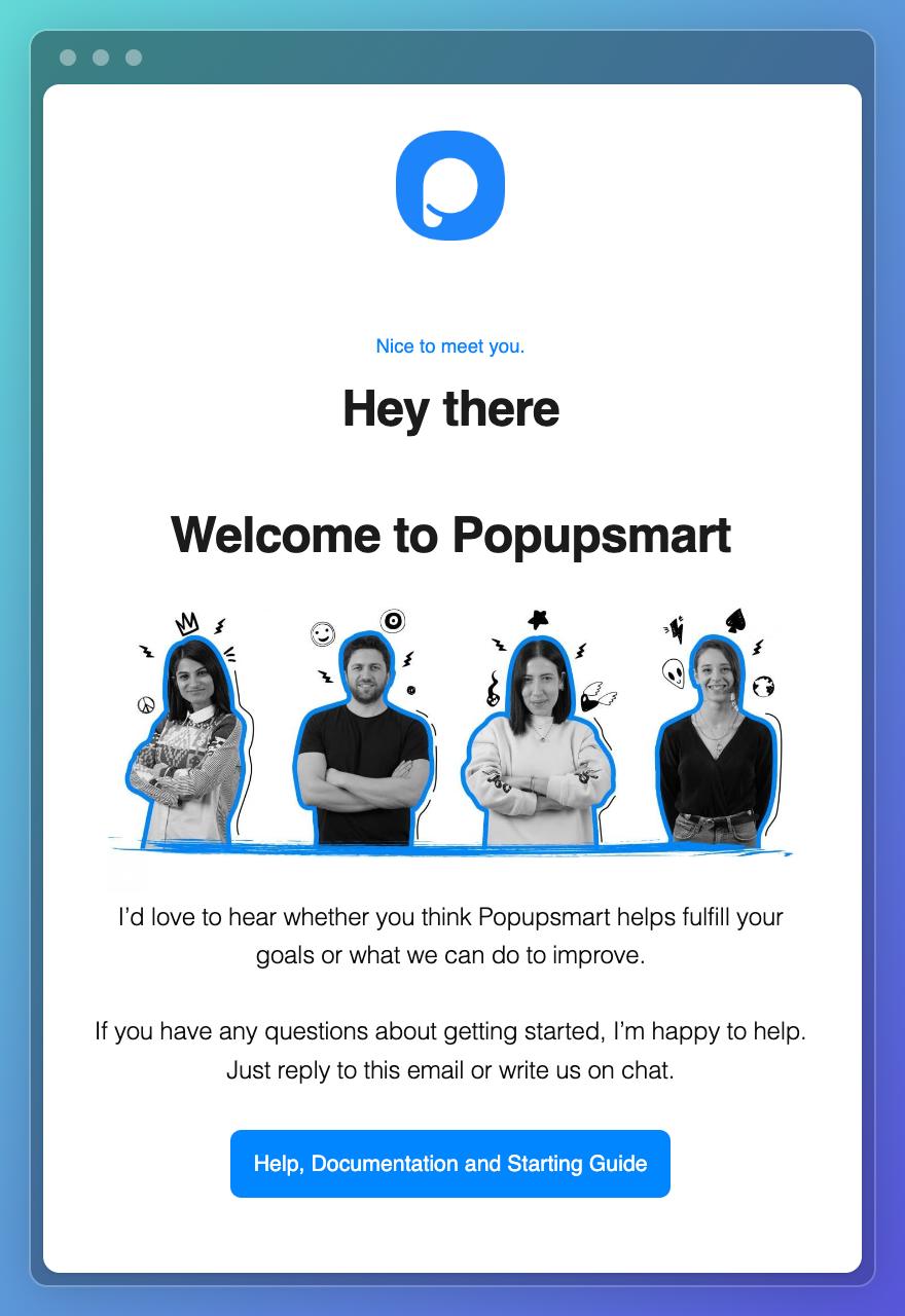 a screenshot of a welcoming email from Popupsmart, a no-code popup builder, a transactional email best practice example using brand's style with faces of the team members and a text saying "Welcome to Popupsmart"