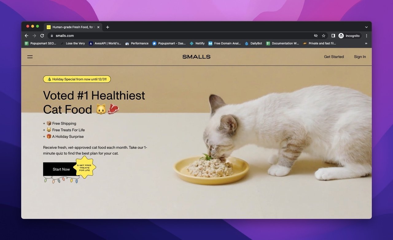 Smalls homepage with a cat eating food