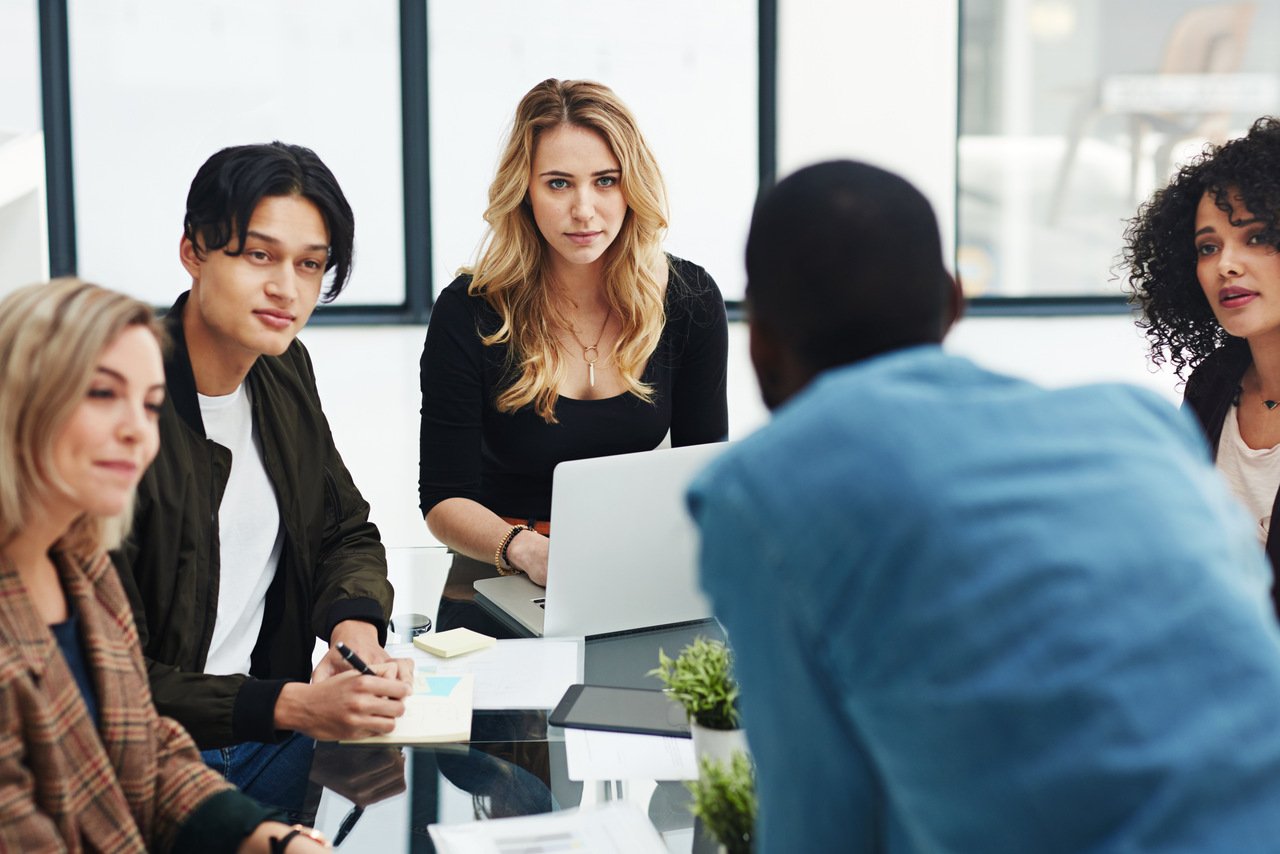 the team discussing productivity in a meeting