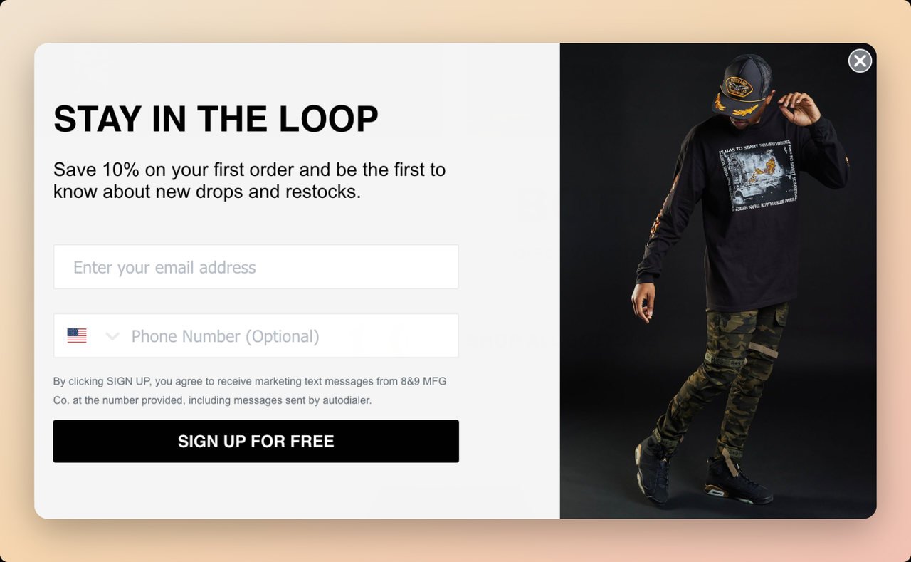 8and9 SMS popup example with a bold text that says "Stay in the loop" and a black call to action that says "Sign up for free" with an image of a man wearing thhe brands streetwear products