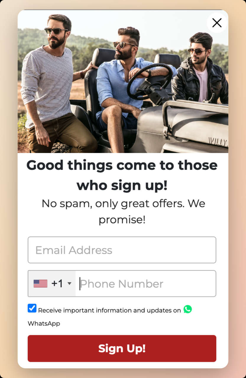 The man company SMS popup example with a picture of 3 men with a car looking to the left side wearing eye glasses on top and a bold text that says "Good things come to those who sign up!"