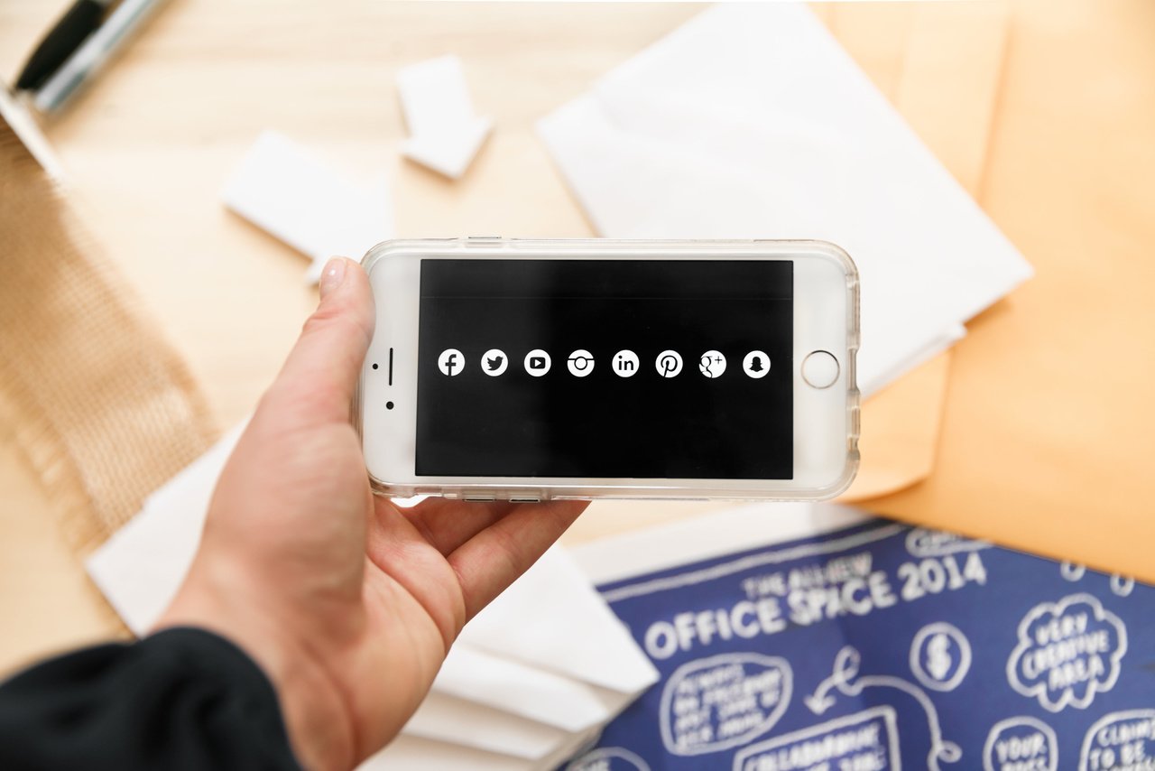 social media icons on an iPhone screen