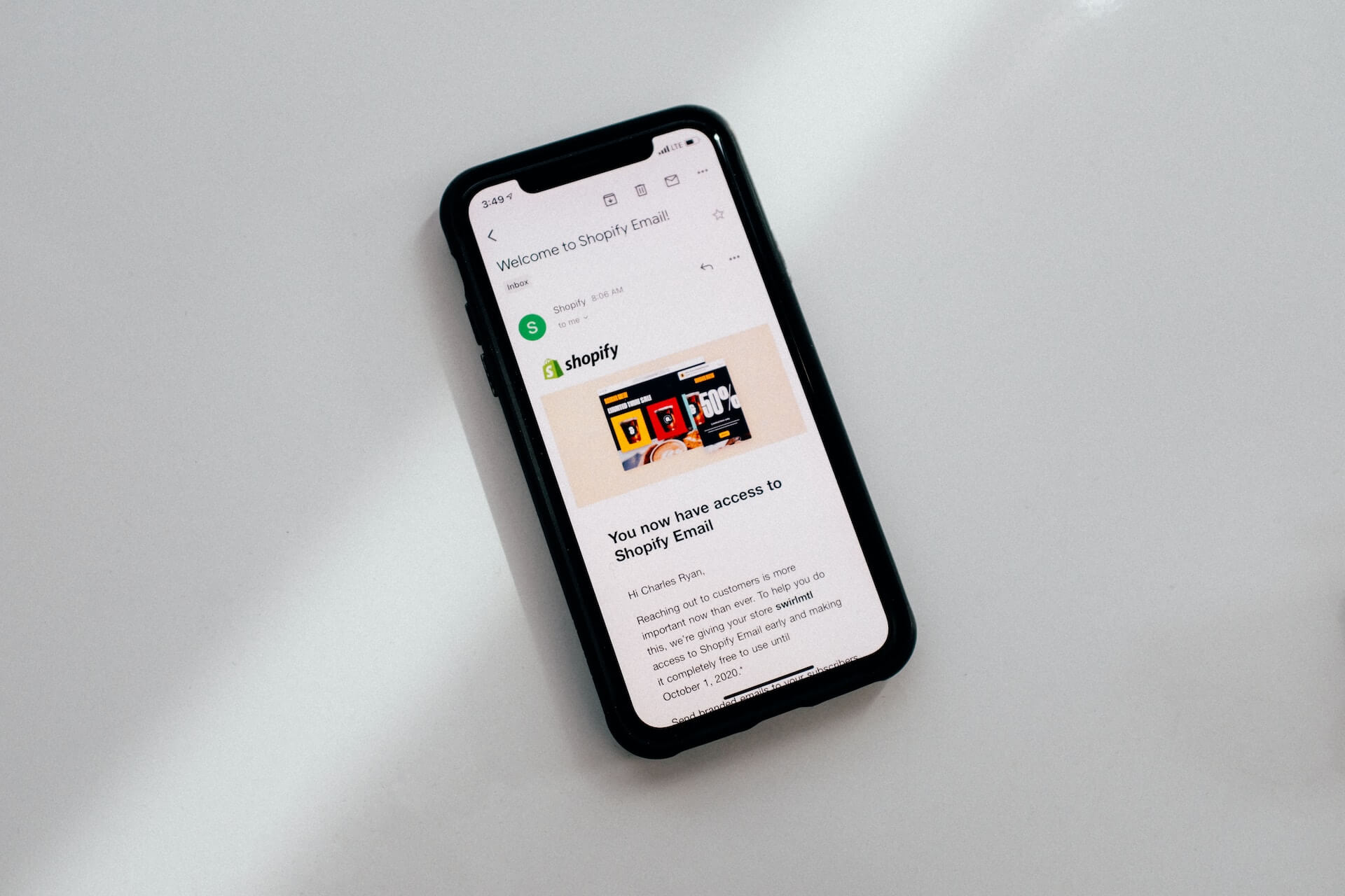 an iPhone displaying an email from Shopify