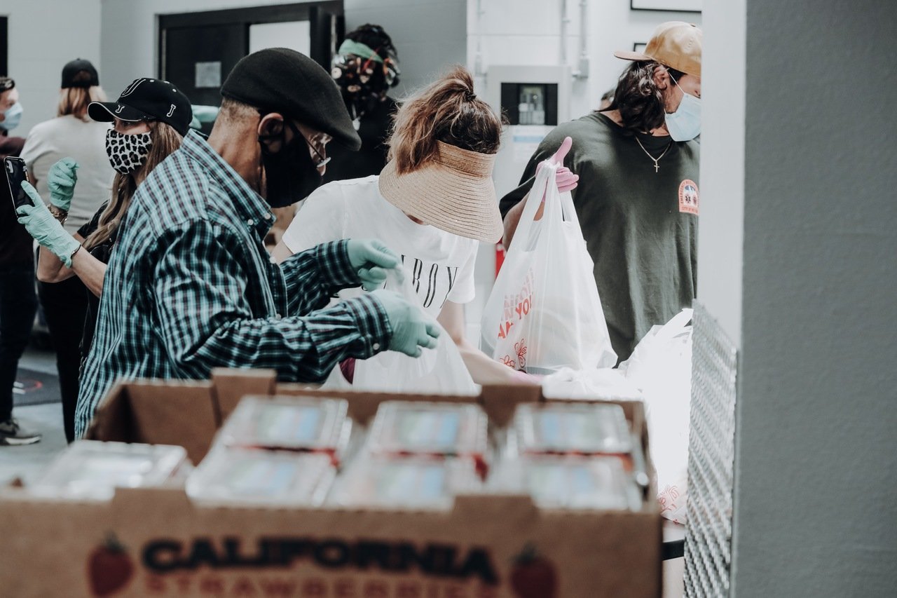 people carrying bags