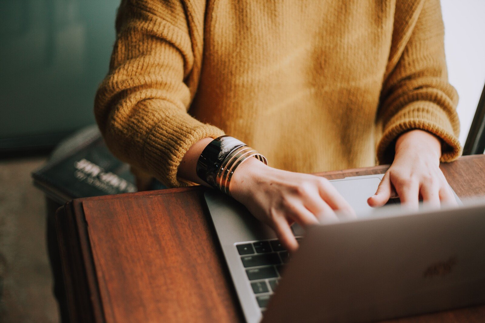 a person using a computer and typing