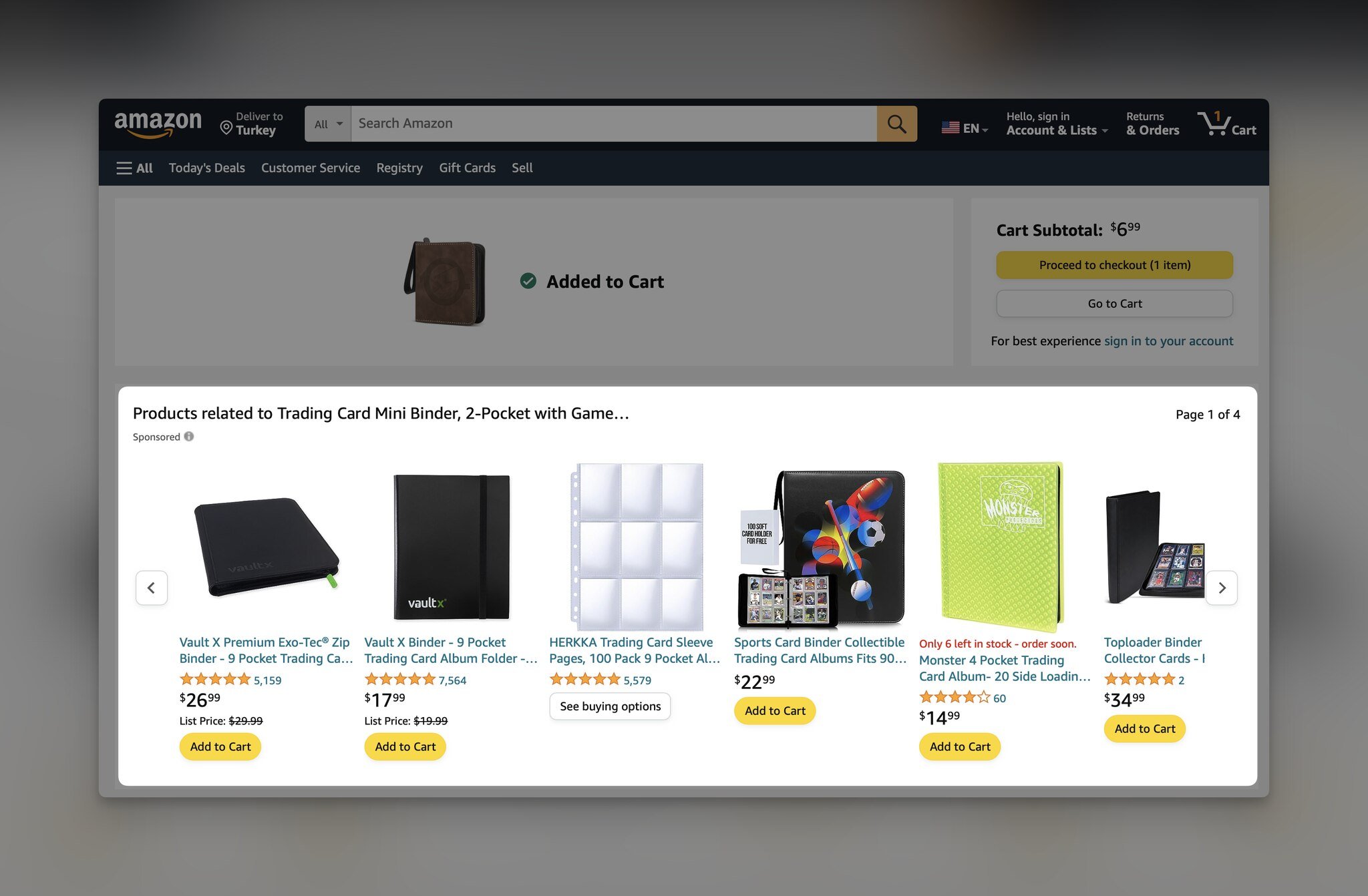 Amazon recommended products section highlighted, showing related items to a card binder, with the card binder item above