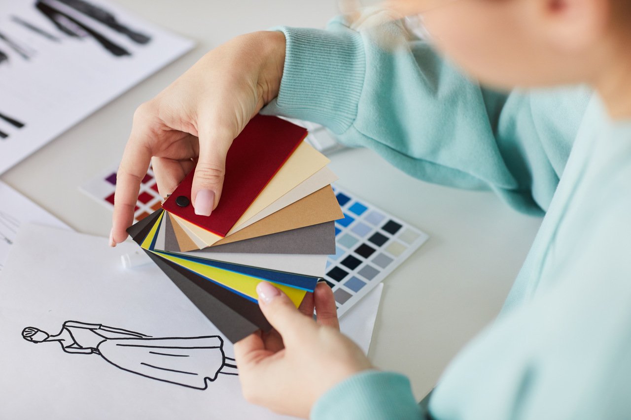 a person watching patterns on color swatch