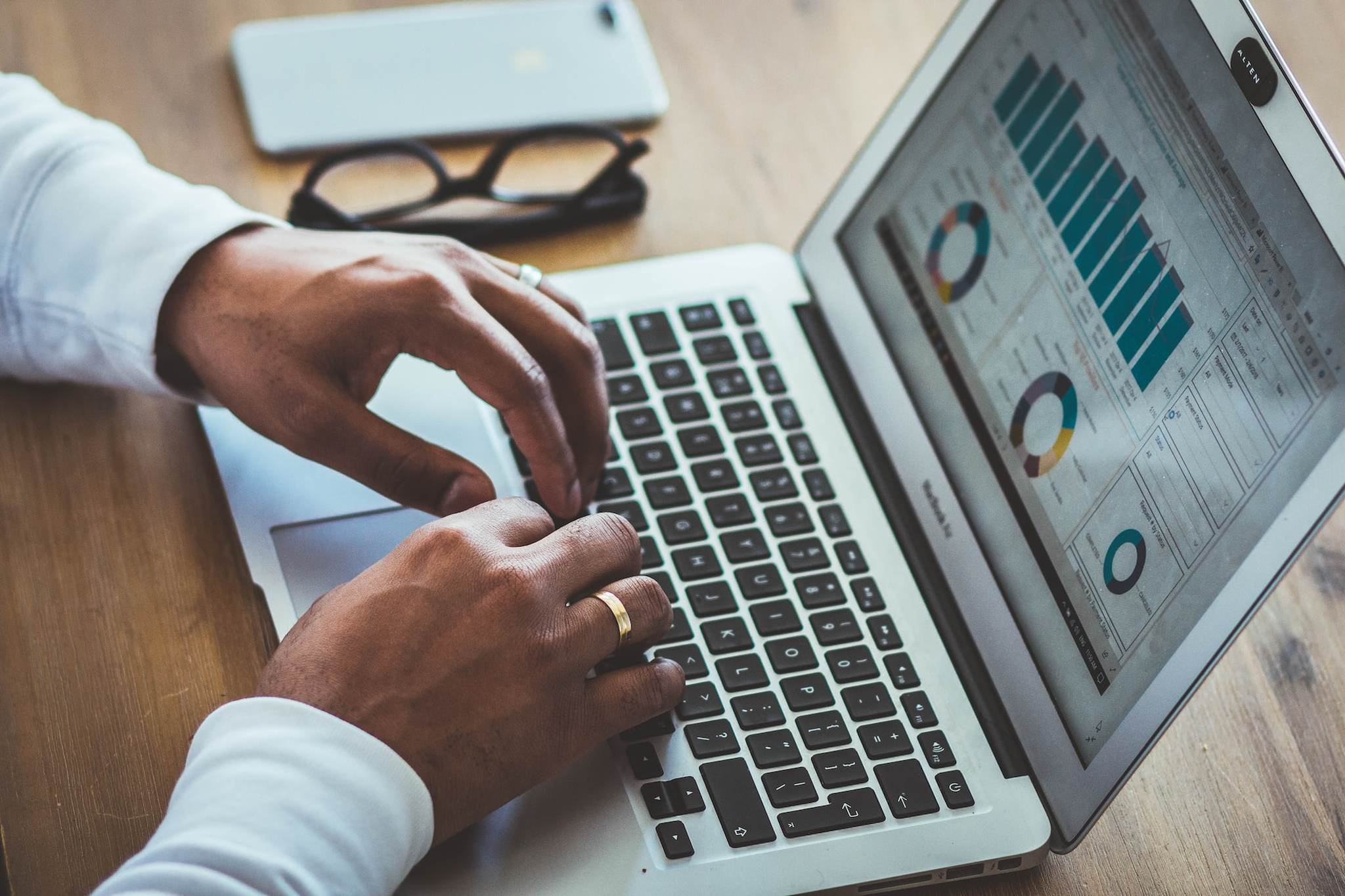 a person using laptop and checking data