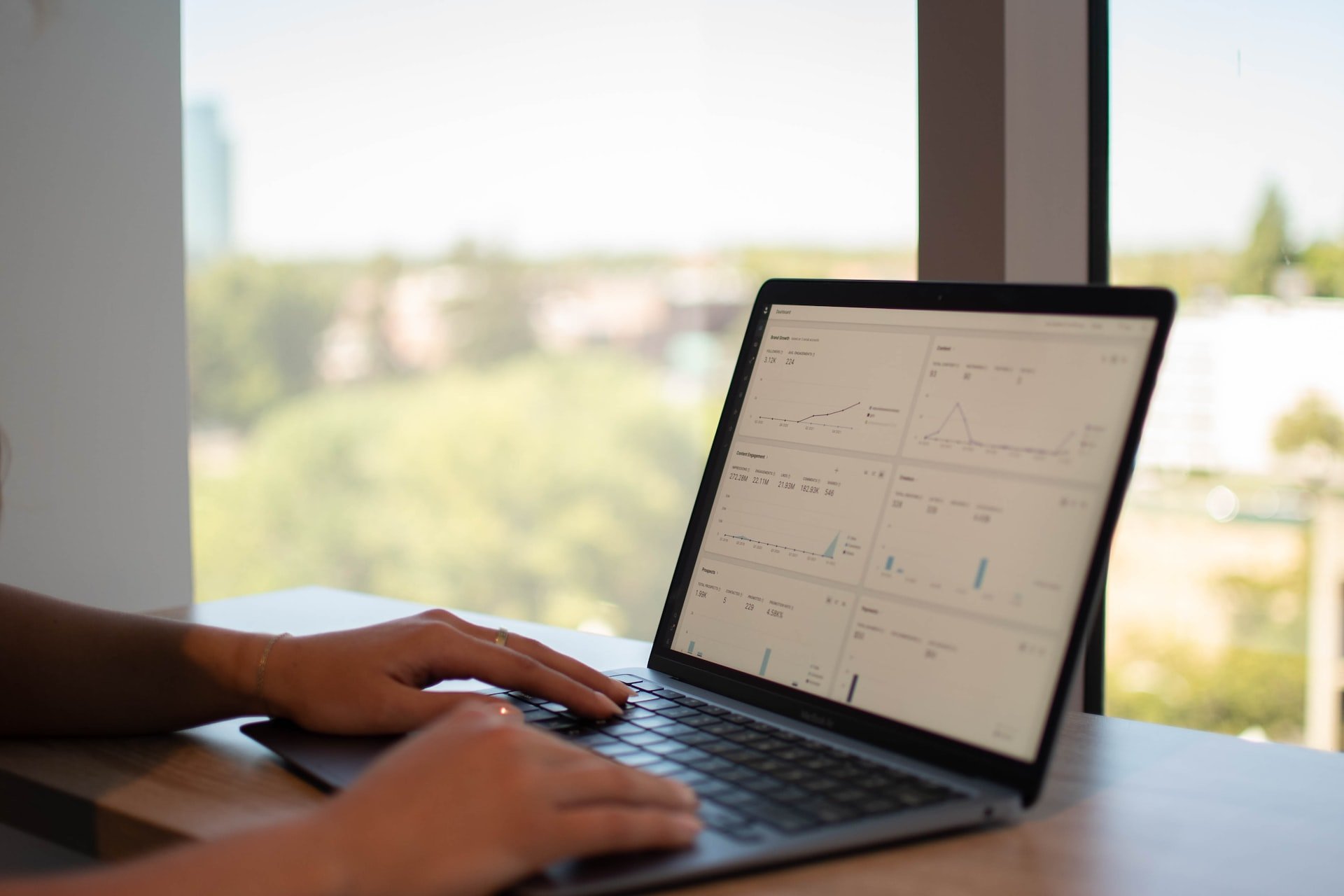 a person viewing data on laptop