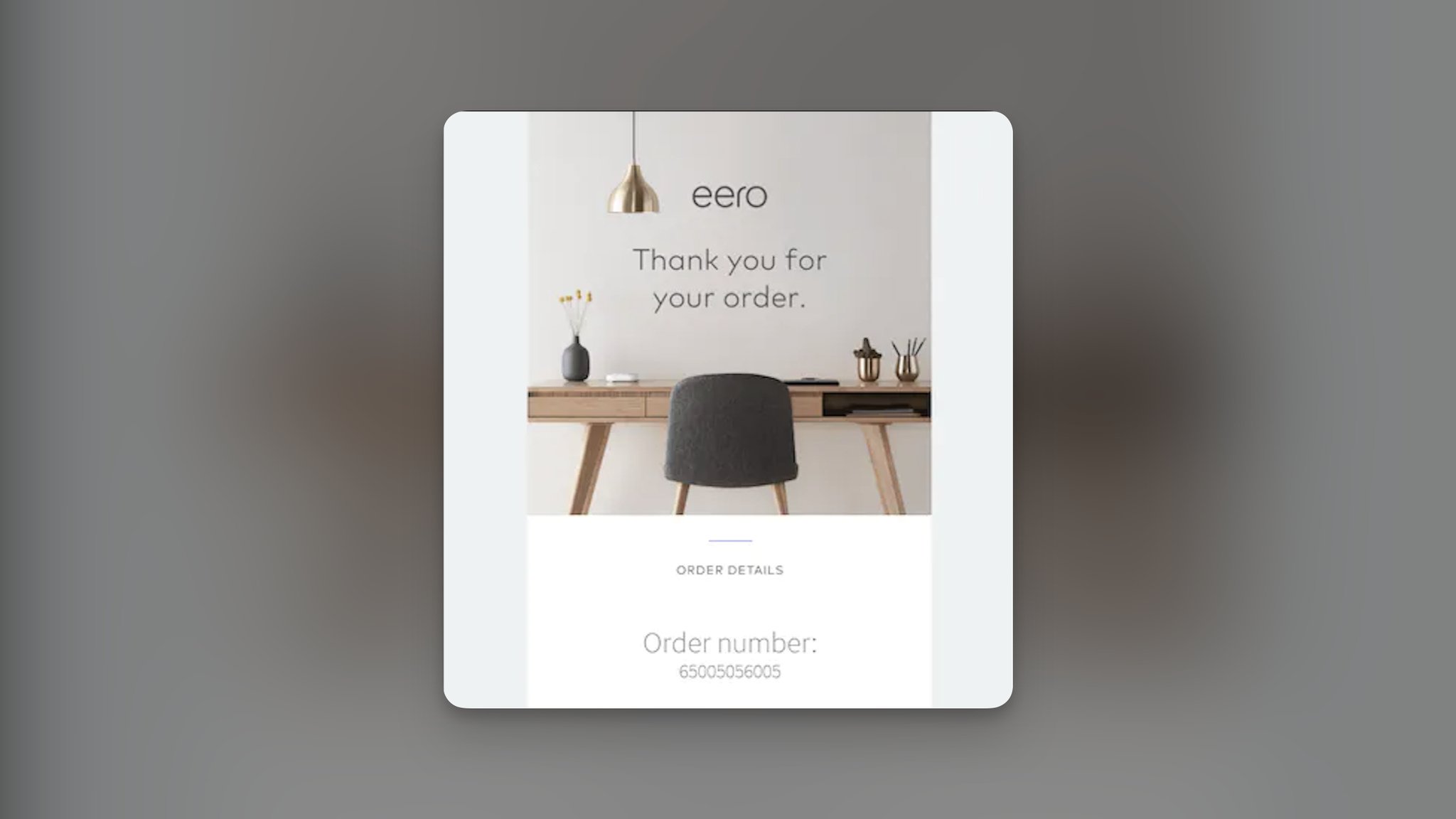 A thank you email with the text “Thank you for your order” on an image displaying a desk with accessories and a chair