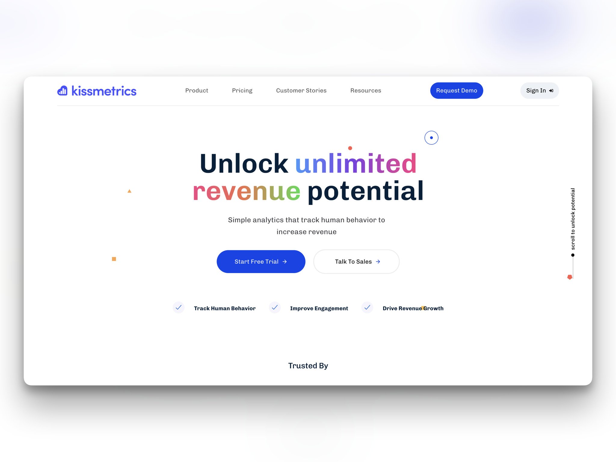 Kissmetrics homepage with the headline “Unlock unlimited revenue potential” showing “unlimited” and “revenue” in rainbow colors followed by “Start Free Trial” and “Talk to Sales” buttons