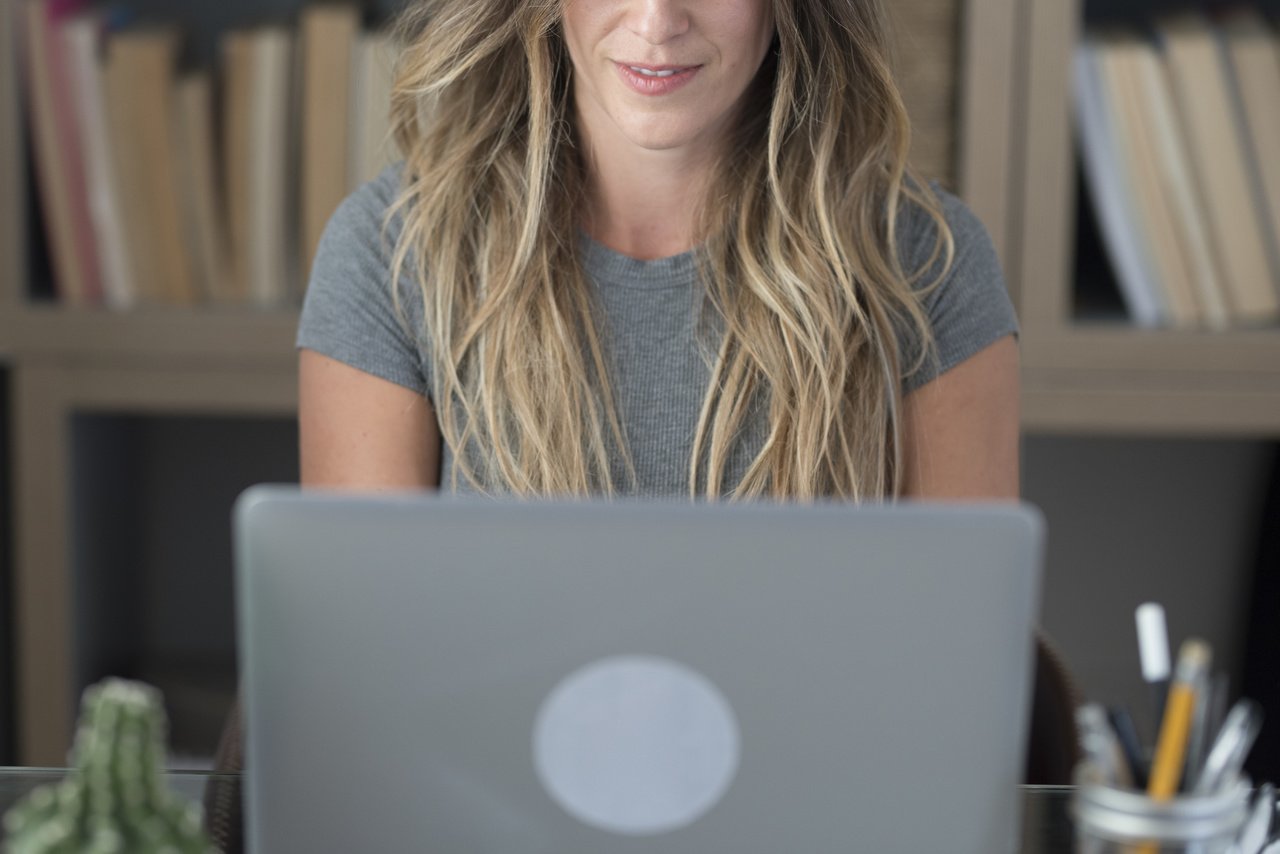 adult woman using laptop