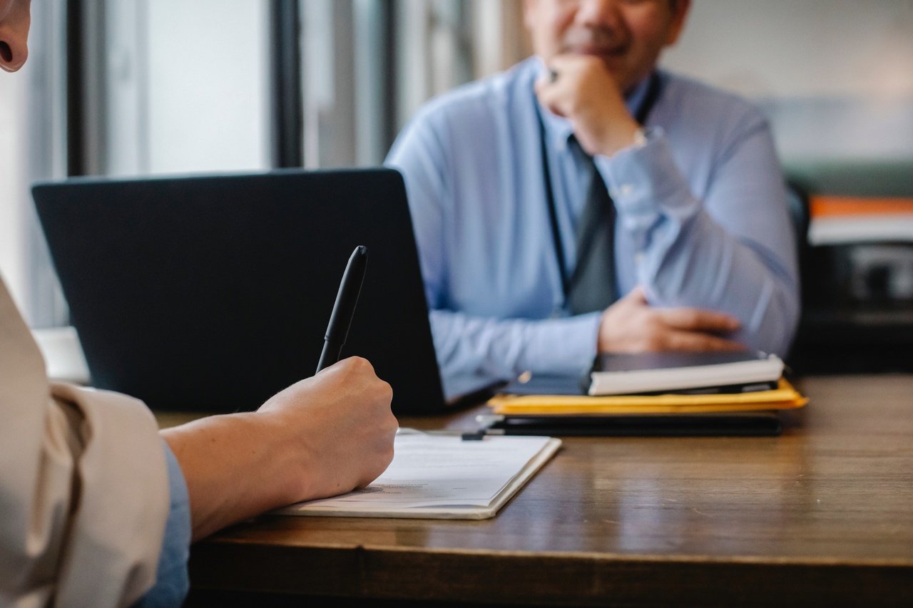 woman filling form with a man