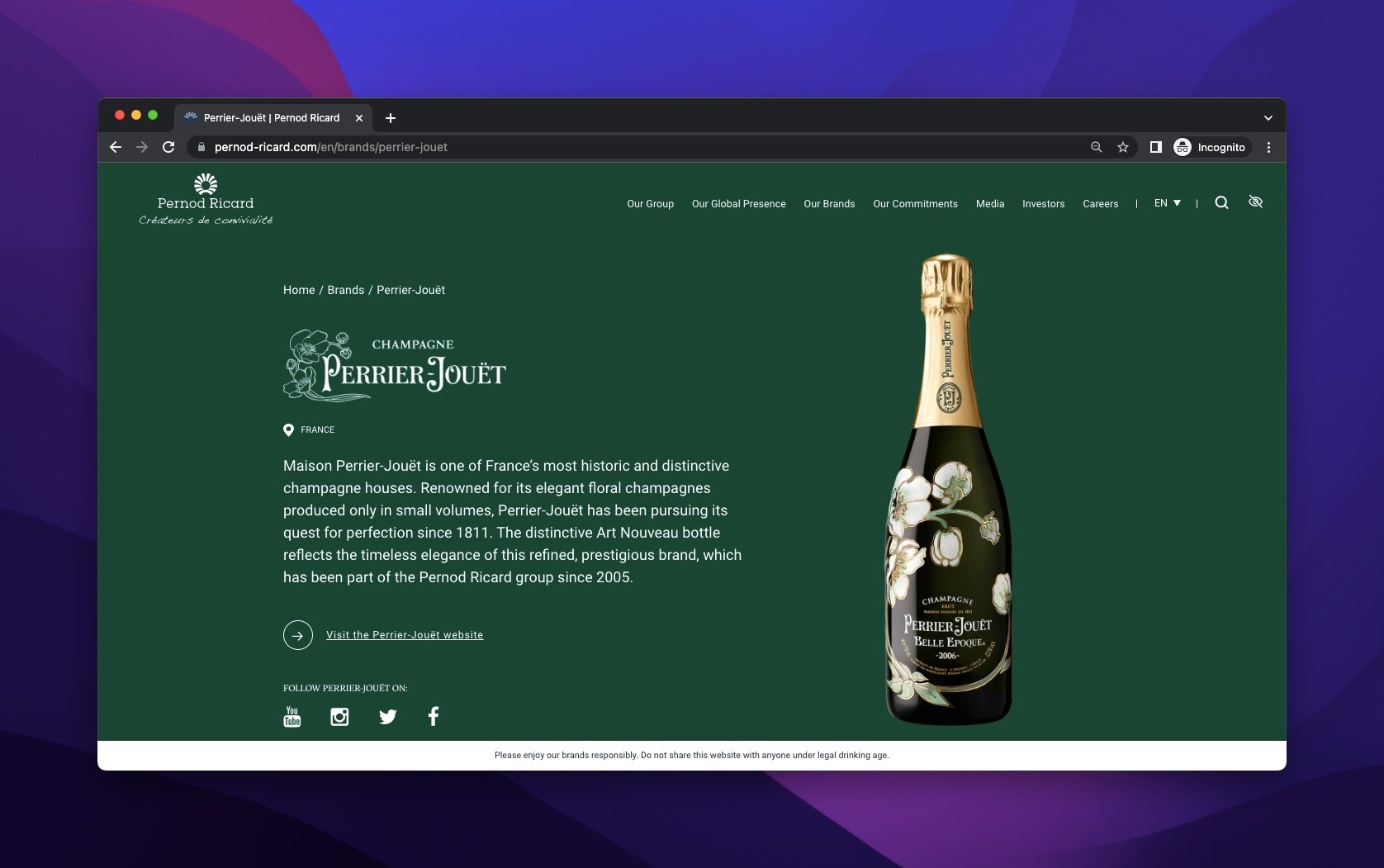 PerrierJouët bottle on a dark green background