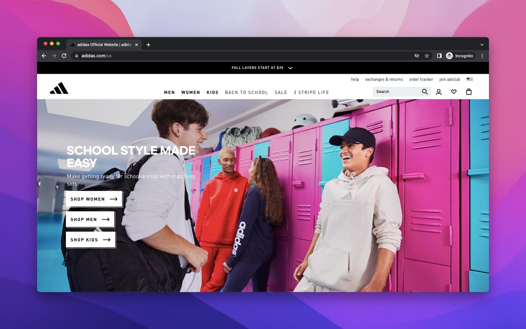 two boys laughing and a couple talking at the background in a school