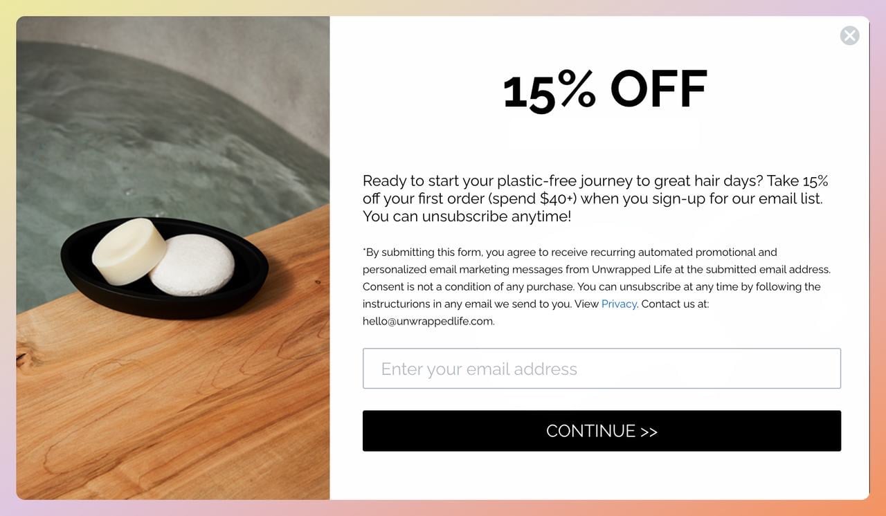 a screenshot of a cart abandonment popup example from unwrappedlife offerig 15% off in return for users' emails