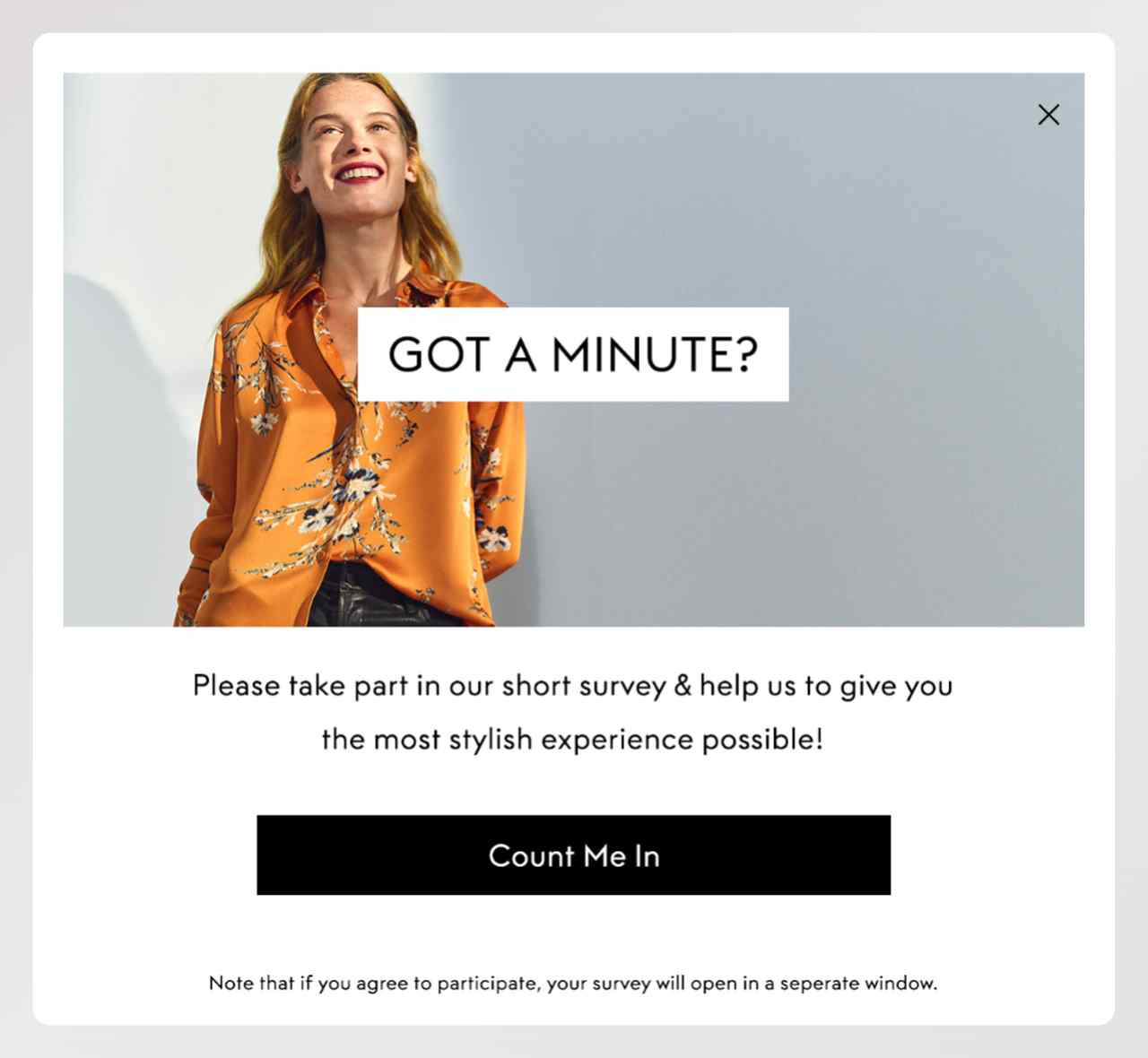 a screenshot of a cart abandonment popup example from Theoutnet asking the visitors if they "Got a Minute" to evaluate their exprience on the website in return for 15% discount code 