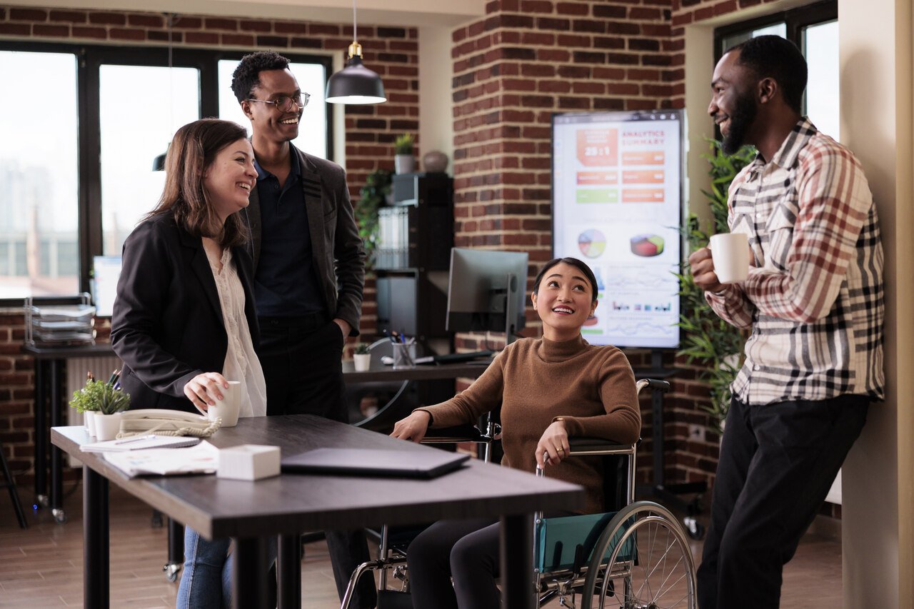 Team members chatting in an office