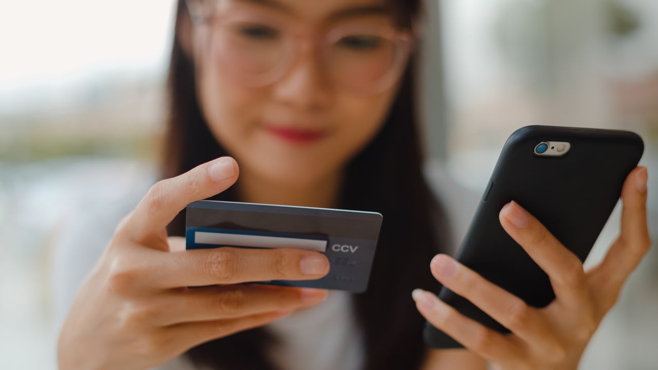 woman making purchase on mobile