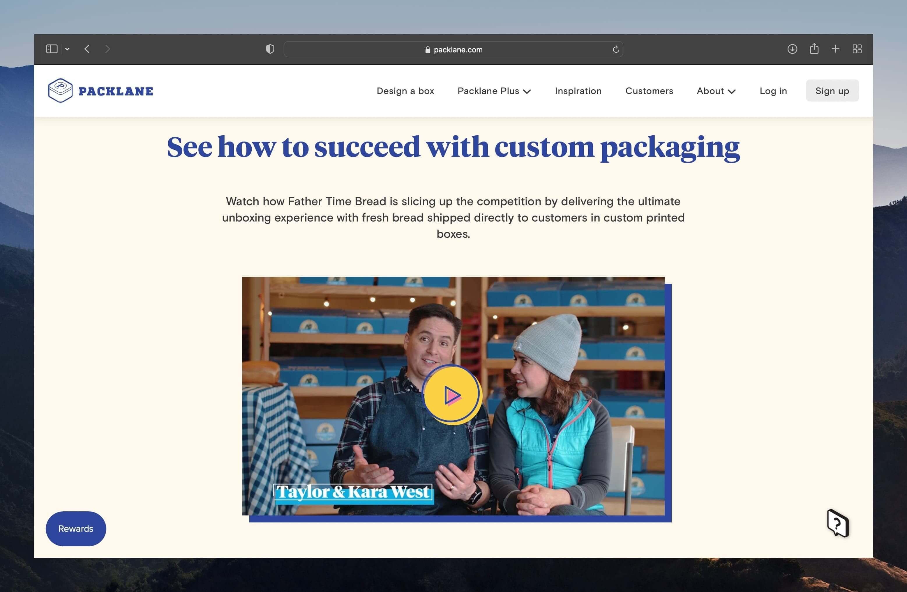 a screenshot of Packlane's website showing a testimonial video with a man and a woman featuring
