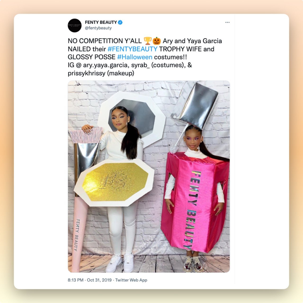 a screenshot of a tweet from Fenty beauty brand showing two girls wearing its products customs as a Halloween marketing campaign idea