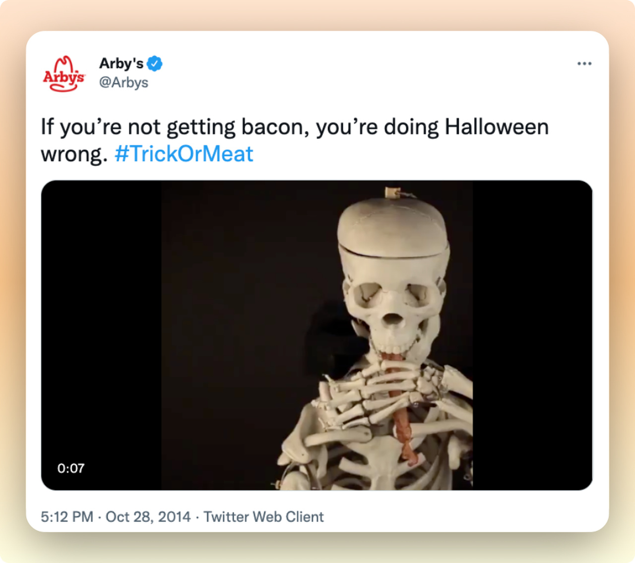 a screenshot of Aryb's tweet showing an esclaton gif and a caption with a trick or meat hashtag using wordplay as a Halloween marketing campaign idea