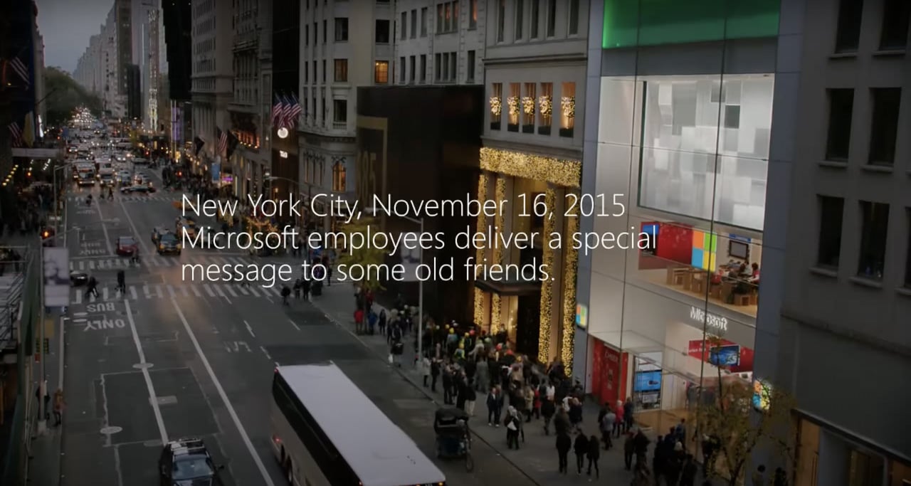 microsoft christmas ad with a busy street blurred behind and a text about special message to old friends on it