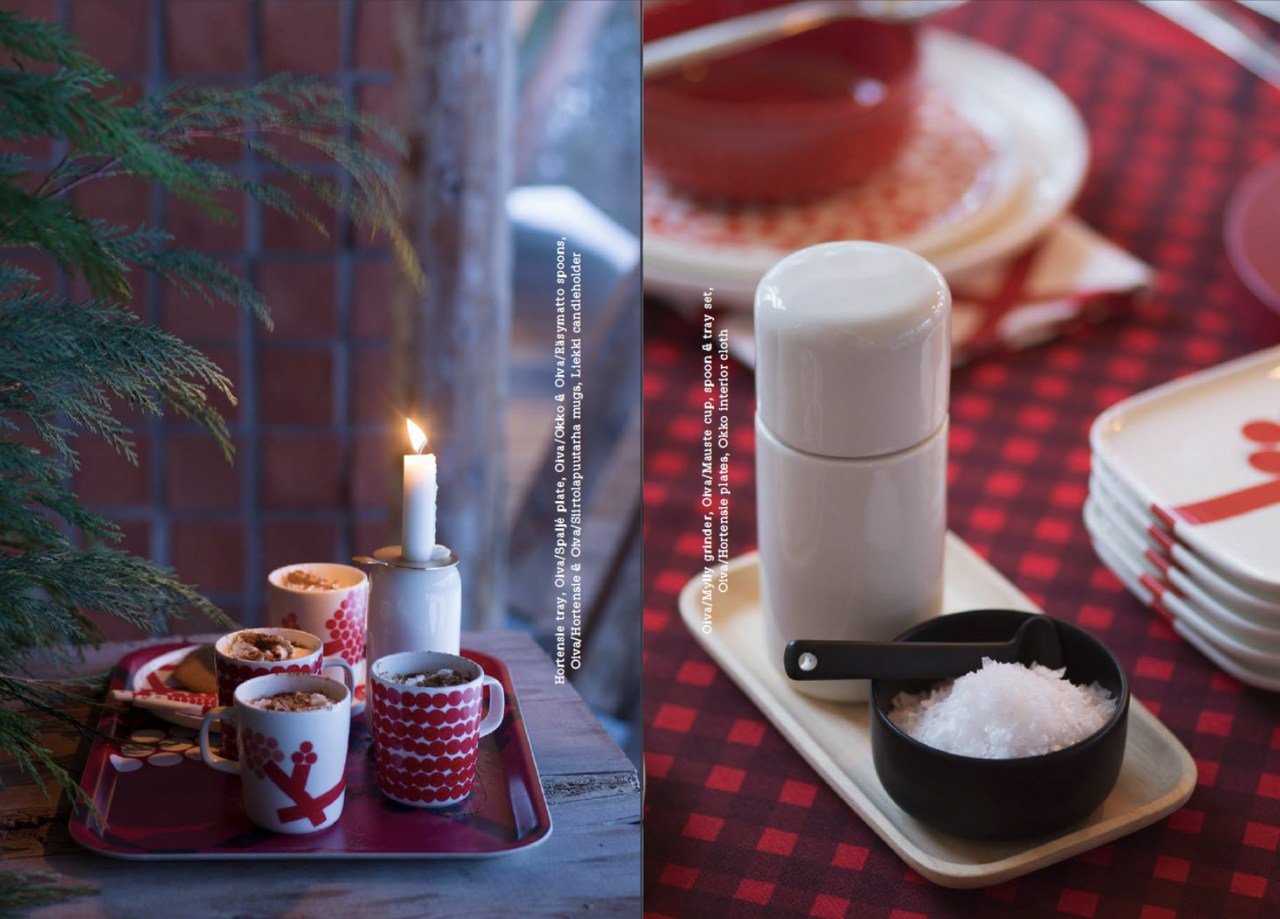 christmas catalog example with candles and cups on the left and a cup of salt-like material nect to a bottle with Christmas-themed plated behind