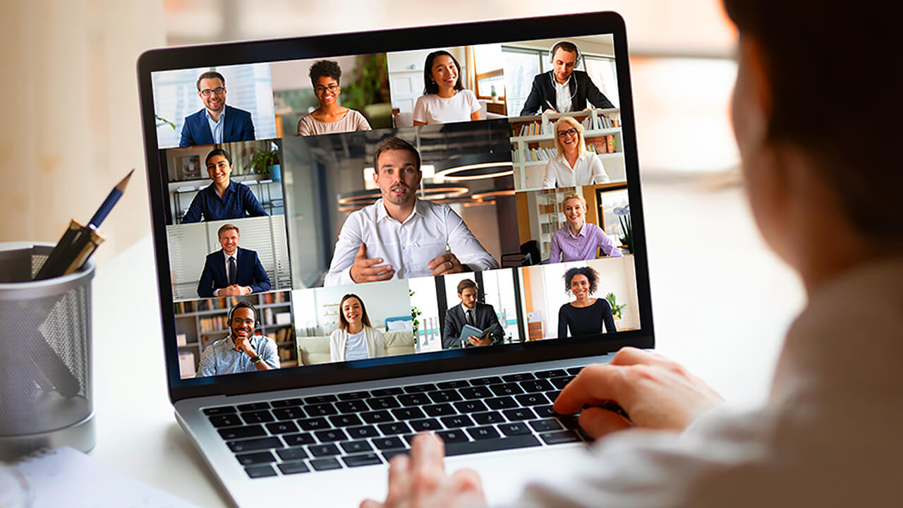 Man having zoom meeting with team