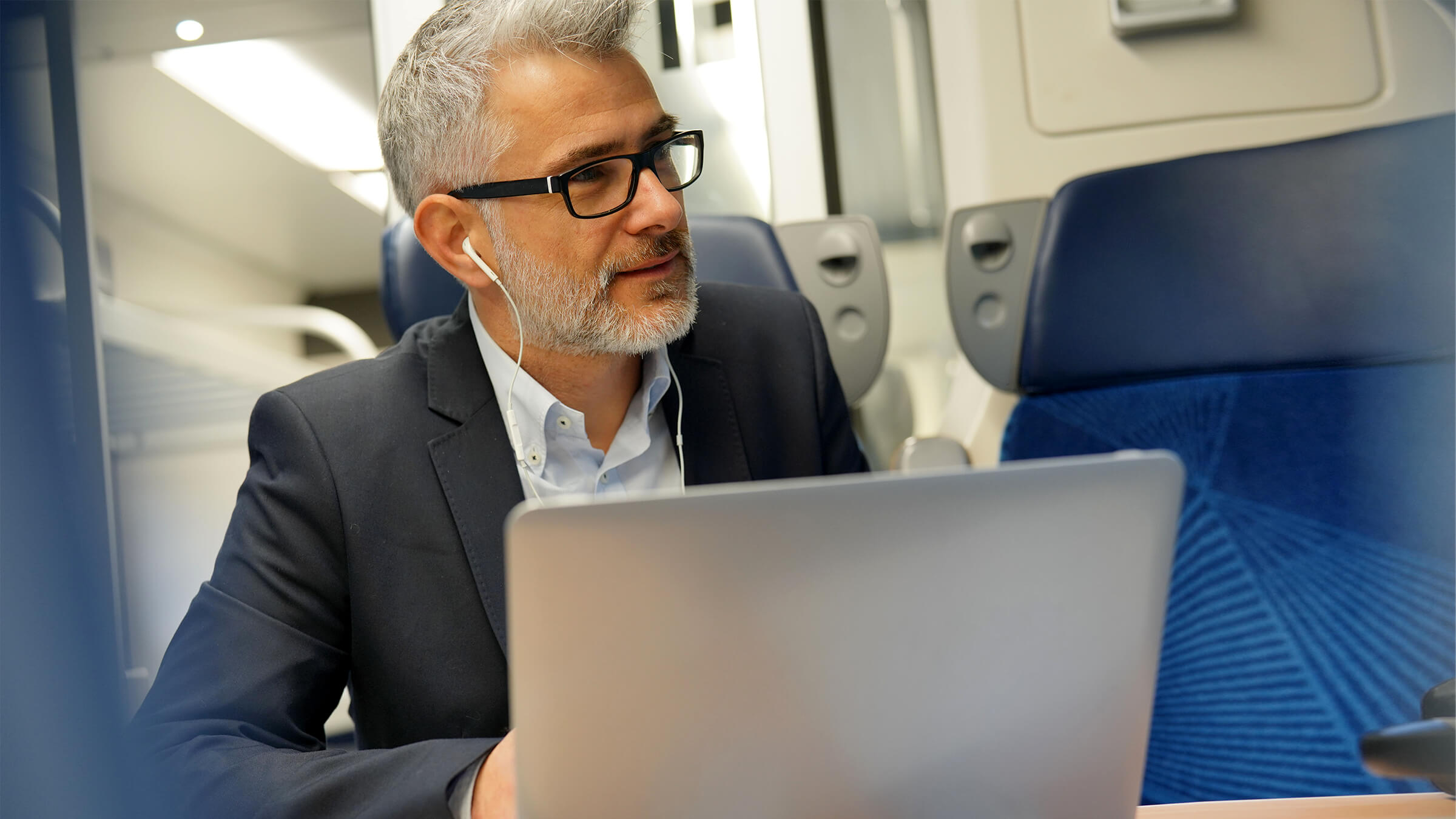 Executive being briefed on plane}