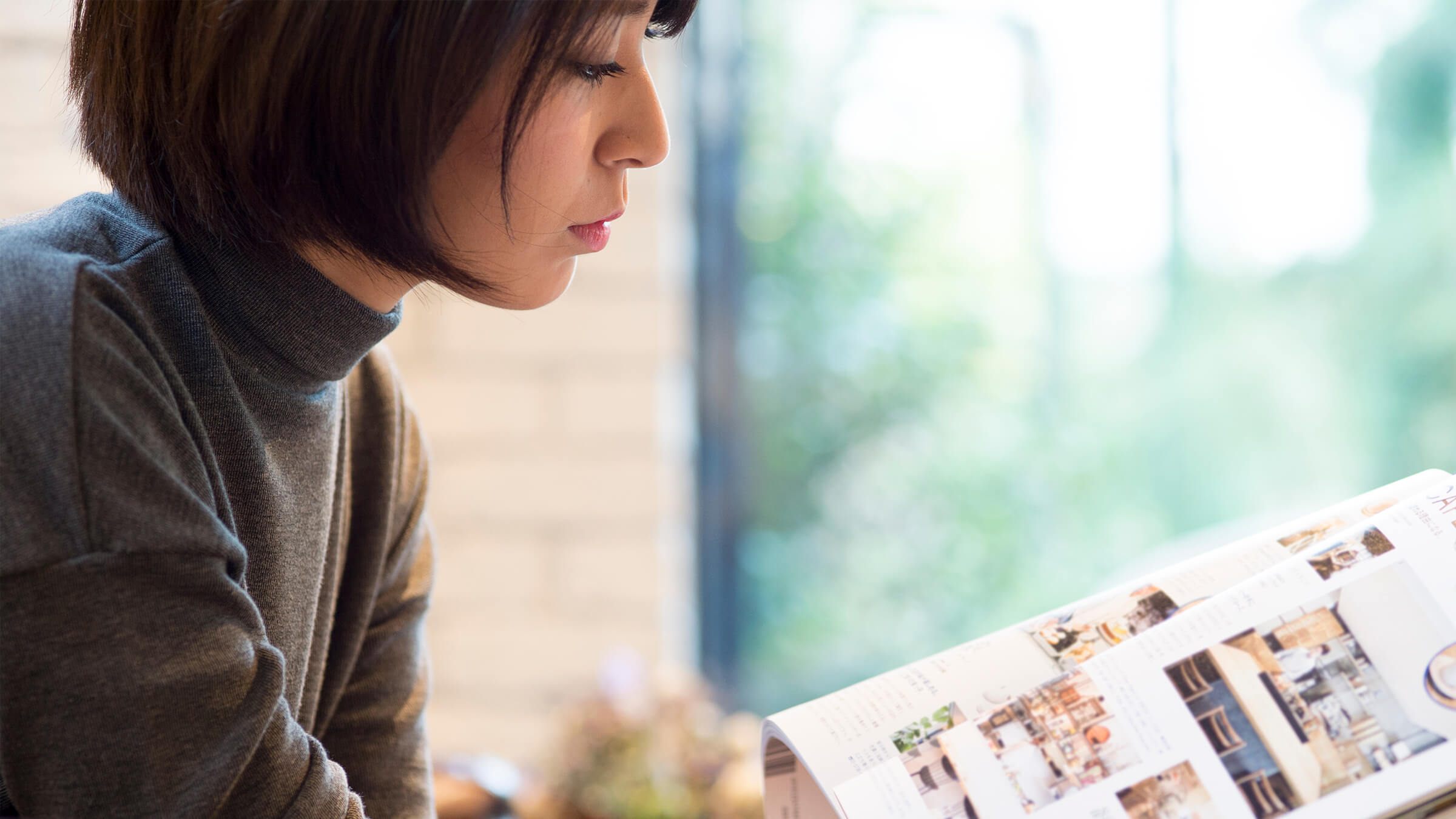 Person looking at magazine