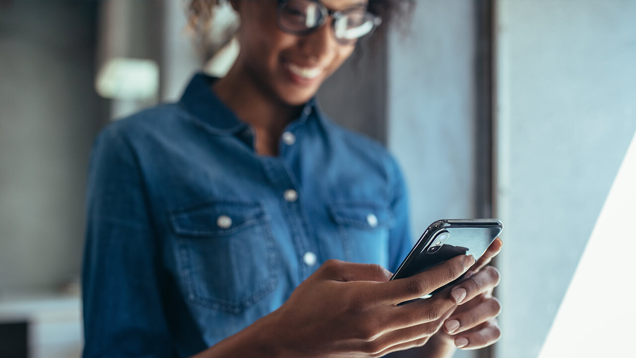 Businesswoman using cell phone