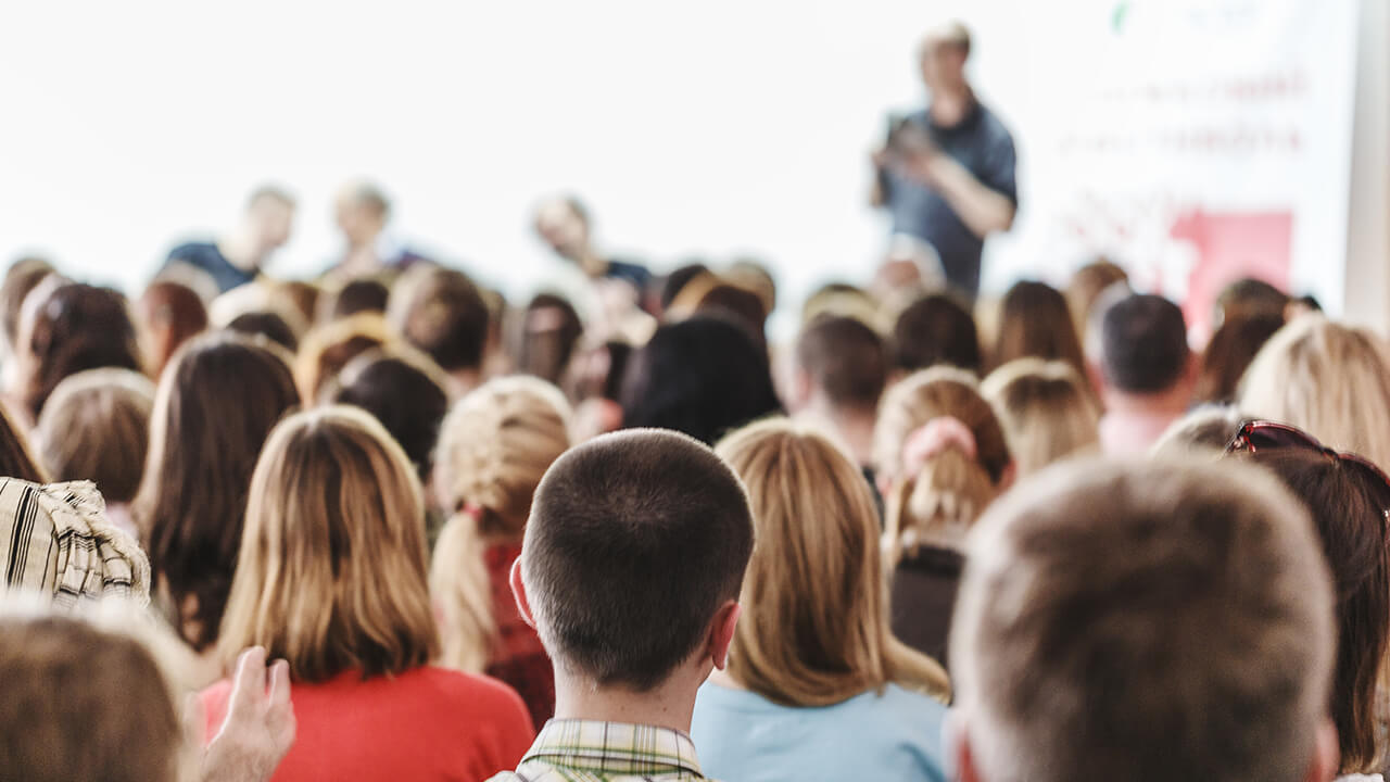 Audience listening to presentation