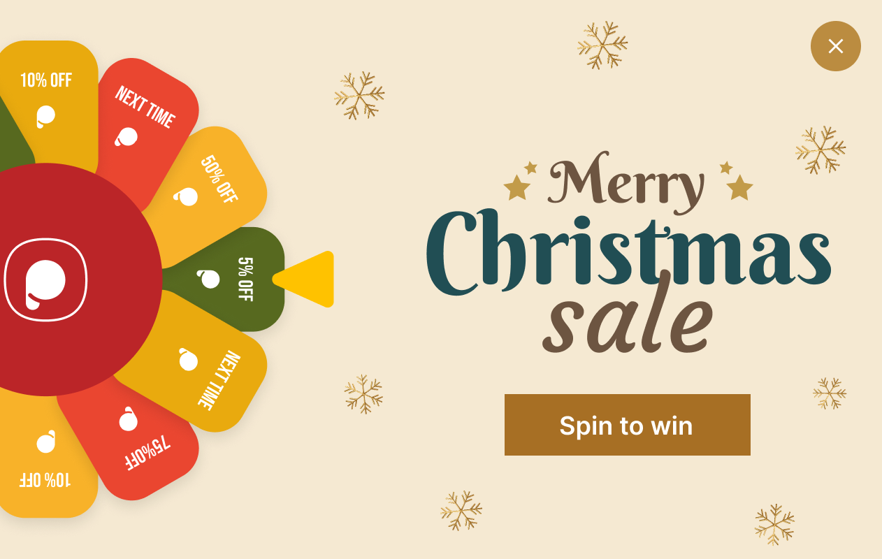 gamified christmas popup by Popupsmart with a spinwheel on the left and "Merry Christmas sale" title on the right folllowed by a spin to win button